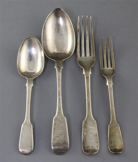 A matched part canteen of 19th century silver fiddle pattern flatware, 143oz.